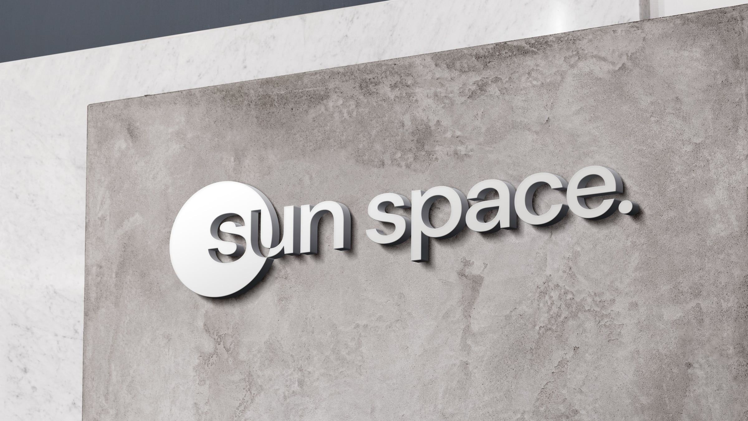 Dimensional logo on a concrete wall